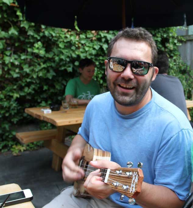Joey plays ukulele